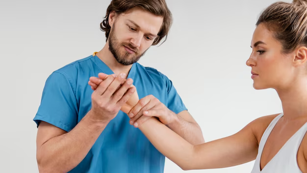 Therapist checking a patient's wrist